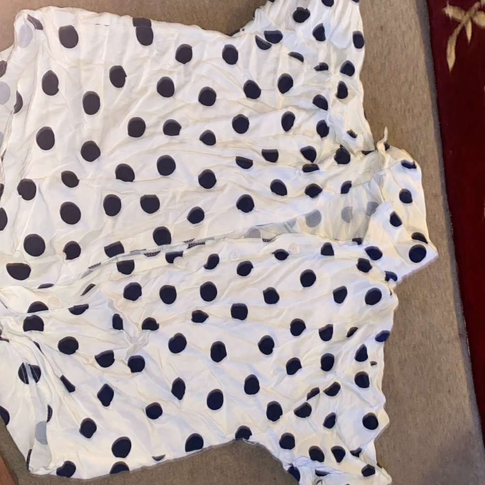 White polka dot shirt. Size L